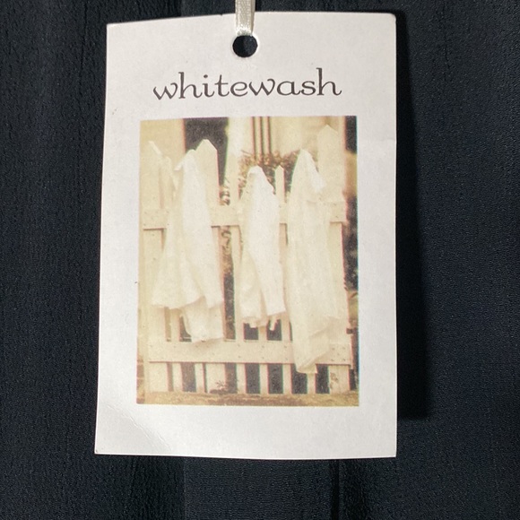 Whitewash brand skirt. Very black with a gentle ruffle on the bottom. - Picture 3 of 7